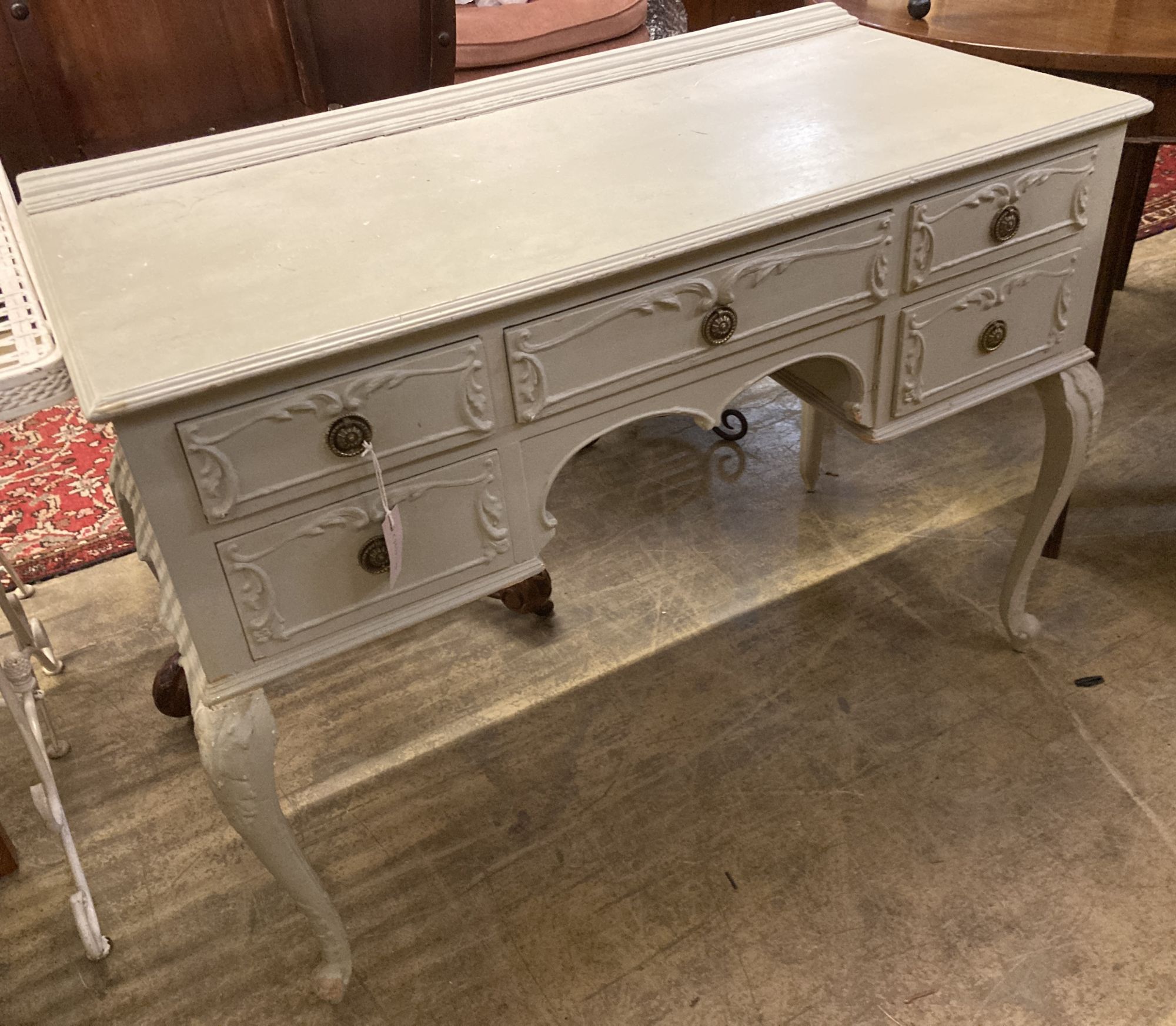 A painted kneehole dressing table, width 110cm depth 53cm height 78cm